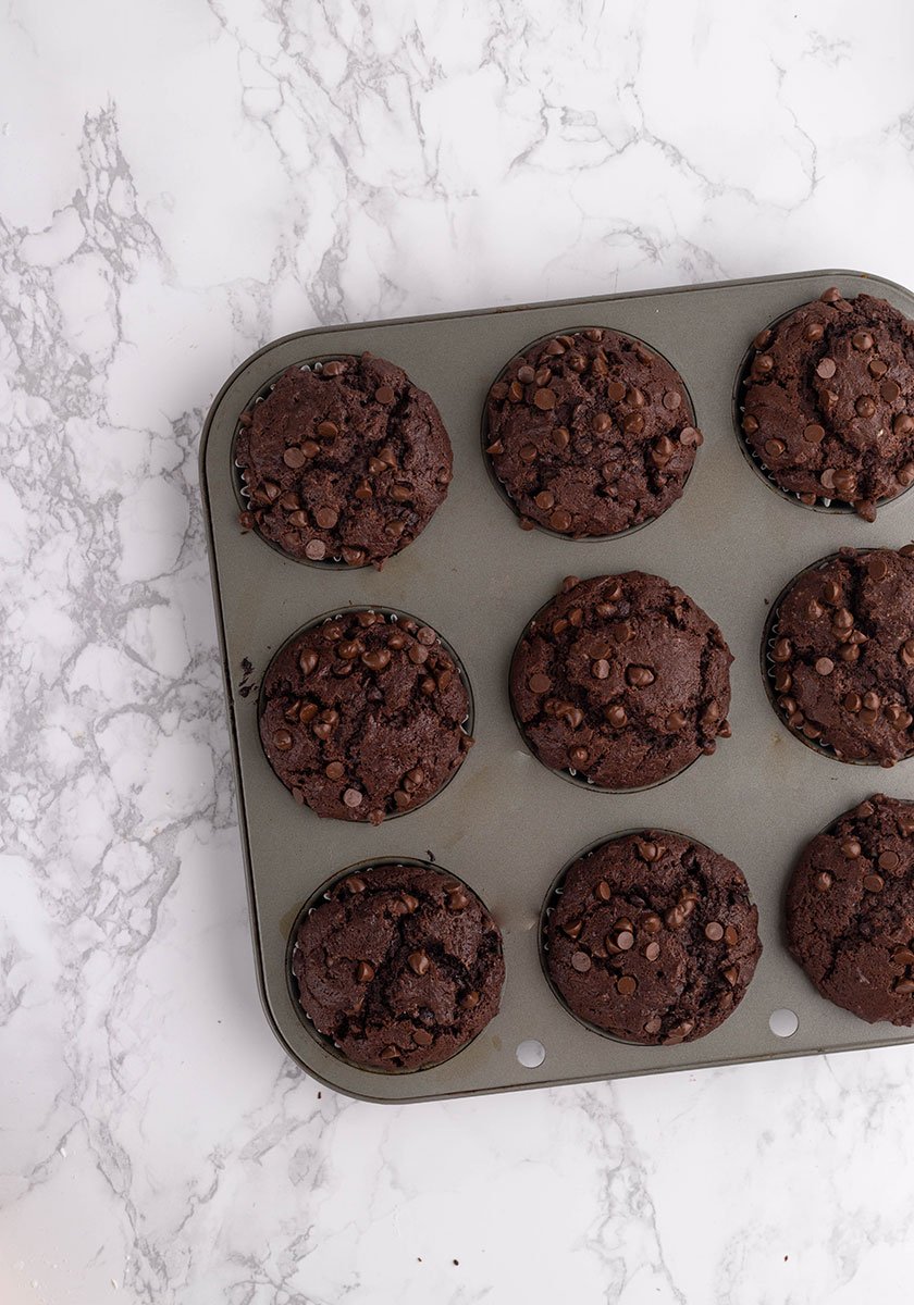 vegan double chocolate muffins in a tin