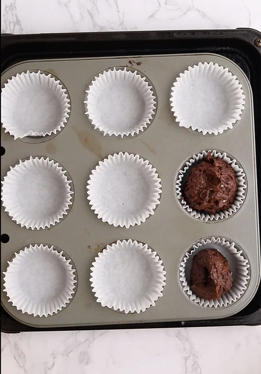 vegan double chocolate muffins in a tin